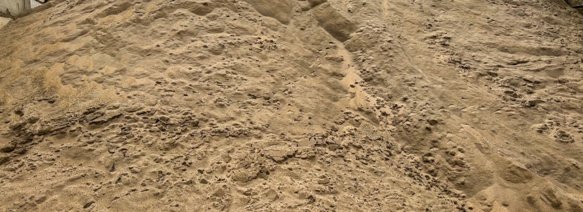 zand bult grondstof bouwstof rouwmaat